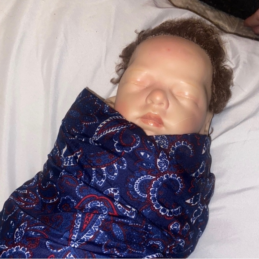 Realistic Baby Doll with Blue Swaddle
